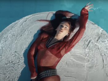 Dua Lipa’s “Illusion” Music Video Style: Black Wide Belt With Darts Dua Lipa Dua Lipa