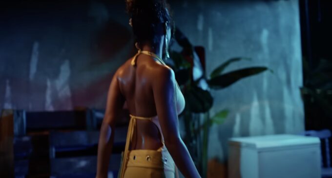 Tyla’s “Water” Music Video Style: Yellow Halter Neck Backless Top Tyla music video fashion