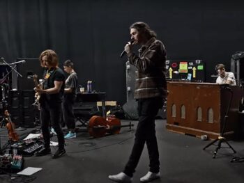 Hozier’s “Too Sweet” Music Video Style: White Textile Sneakers Hozier Hozier